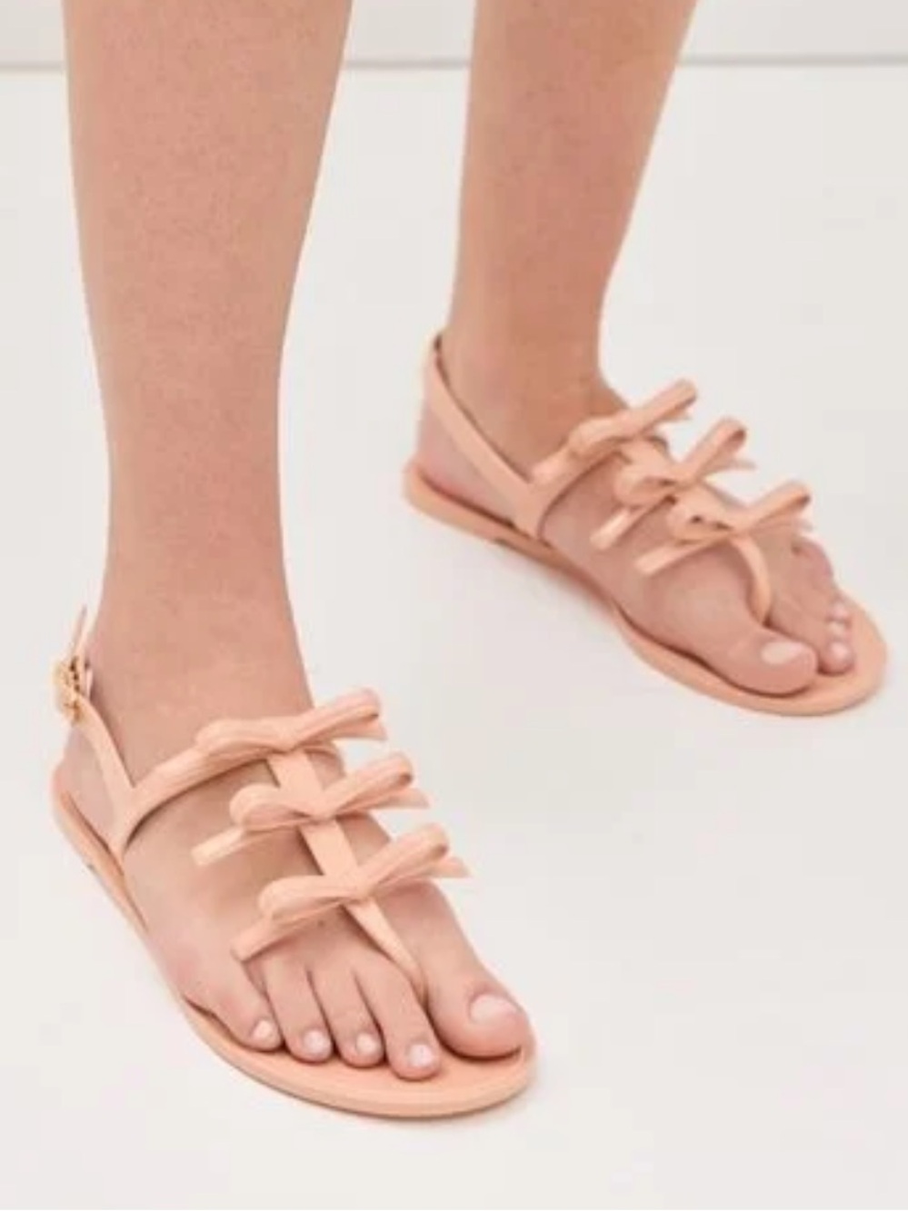 Stuart Weitzman Leather T-Strap Bow Sandals in Blush Peach
